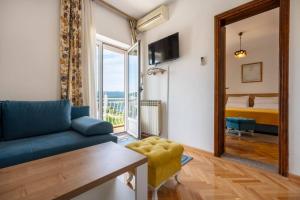 Giường trong phòng chung tại Apartmani Ina