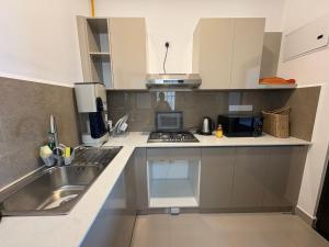 Køkken eller tekøkken på Santorini Apartment - Negambo