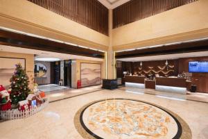 TV a/nebo společenská místnost v ubytování Fuzhou Xin Zi Yang Hotel