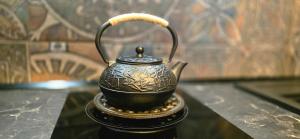 a vase sitting on top of a table at Amore Grande in Samokov