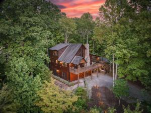 an overhead view of a house in the woods at Merlot Chateau - Views, New Hot Tub, Fire Pit, Game Room, Wi-Fi - Mins to Blue Ridge in Morganton