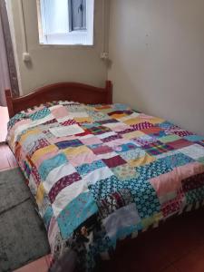 En eller flere senge i et værelse på Petit nid au calme