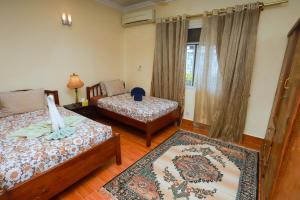 Postel nebo postele na pokoji v ubytování Beit El Raas Villa