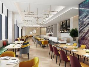 Un lugar para sentarse en Green Tree Inn Express Tangshan Yueting County Bus Station