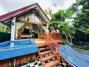 Swimmingpoolen hos eller tæt på Sigiriya Kashyapa Cottage