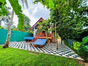 En have udenfor Sigiriya Kashyapa Cottage