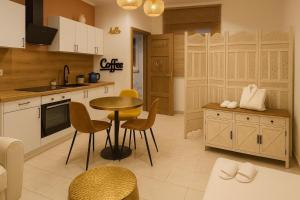 Kuchyň nebo kuchyňský kout v ubytování Villa De Alexiano + 16 fotografií