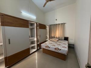 En eller flere senge i et værelse på Tranquill Villa