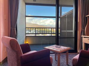 Nespecifikovaný výhled na hory nebo výhled na hory při pohledu z hotelu