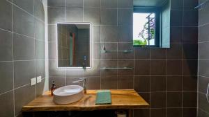 Et badeværelse på Titine Apartment