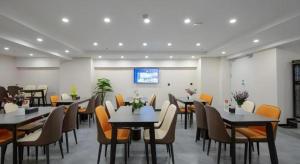 Μια τηλεόραση ή/και κέντρο ψυχαγωγίας στο Green Tree Inn Express Heze University Town