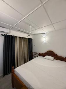 Ένα ή περισσότερα κρεβάτια σε δωμάτιο στο White place