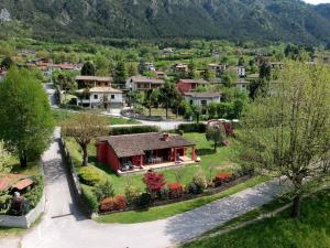 an aerial view of a house in a village at Idyllic cottage next to the beautiful Lake Idro in Crone