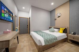 Ένα ή περισσότερα κρεβάτια σε δωμάτιο στο Shanghai Grand View Hotel