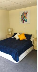 Ένα ή περισσότερα κρεβάτια σε δωμάτιο στο Peace and Tranquility