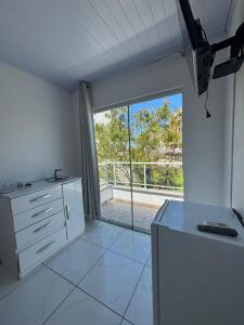 Køkken eller tekøkken på Residencial Dona Duda