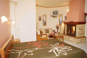 Postel nebo postele na pokoji v ubytování Guesthouse Irida