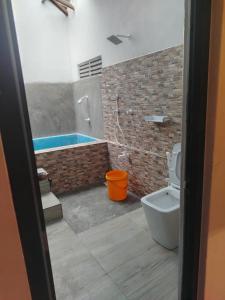 Un baño de Corner Cottage - Anuradhapura