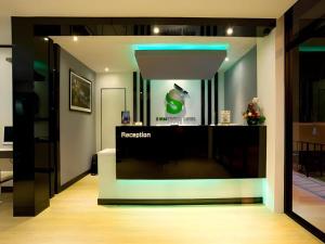 a display of a television in a room at Siamgrand Hotel in Ban Nong Saeng