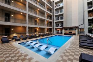 a swimming pool in the middle of a building at Downtown views by the Lake in Austin