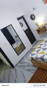 Giường trong phòng chung tại Chez Tyka