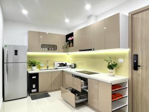 Køkken eller tekøkken på Beer Home Apartment - Huế Free Pool and Gym + 57 billeder