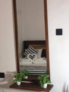 Postel nebo postele na pokoji v ubytování SAMSON'S HOME Hiriketiya , Blue Beach