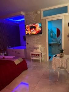 TV a/nebo společenská místnost v ubytování Terraforte Luxury Suite