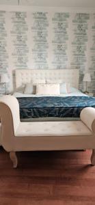 Ένα ή περισσότερα κρεβάτια σε δωμάτιο στο Casa Joaninha