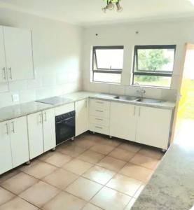 Kuchyň nebo kuchyňský kout v ubytování Pebble urban charm