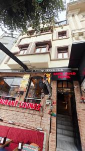 a building with a sign on the front of it at Safir Gold Hotel in Istanbul