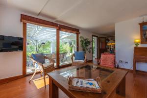 Khu vực ghế ngồi tại Sunny Bird House Bolonia