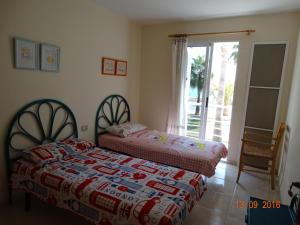 Posteľ alebo postele v izbe v ubytovaní House Marlin