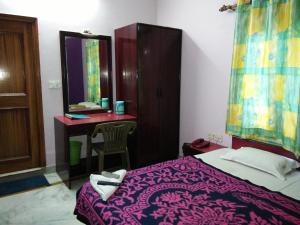 Postel nebo postele na pokoji v ubytování Hotel Mayur