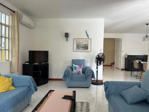 Гостиная зона в Sun Palm Villa - Blue Bay