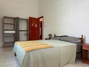 Кровать или кровати в номере Sun Palm Villa - Blue Bay +7 фотографий