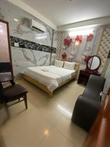 ホーチミン・シティにあるKhách sạn Sang Trọngのギャラリーの写真