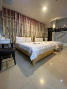 ホーチミン・シティにあるKhách sạn Sang Trọngのギャラリーの写真