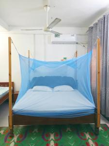 Postel nebo postele na pokoji v ubytování Mamdalis Private Rooms Stonetown