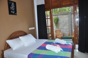 Postel nebo postele na pokoji v ubytování Summerland Residence