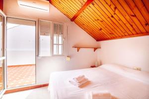 Postel nebo postele na pokoji v ubytování María Luisa Gran Sol Beach