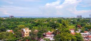 an overhead view of a city with trees and buildings at Oshanbyu Transient Home in Basbas