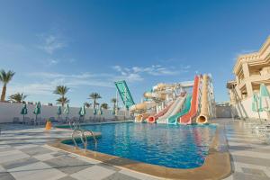 a water park in a resort with a water slide at Flow Spectrum Resort Sahl Hasheesh in Hurghada