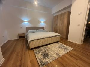 Postel nebo postele na pokoji v ubytování BB Central Apartments