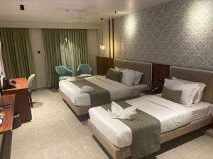 TV a/nebo společenská místnost v ubytování Len R Inn + 5 fotografií