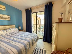 Ένα ή περισσότερα κρεβάτια σε δωμάτιο στο Kapparis Beach Escape