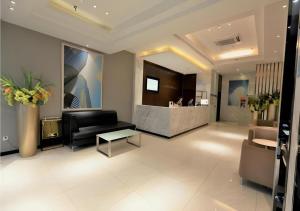 TV/trung tâm giải trí tại City Comfort Inn Yichang Gezhouba CBD Shopping Center