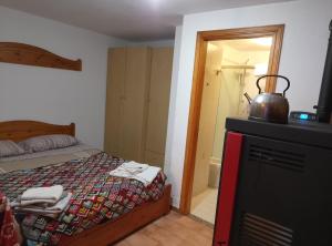 Ένα ή περισσότερα κρεβάτια σε δωμάτιο στο La Meison