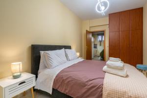 Ένα ή περισσότερα κρεβάτια σε δωμάτιο στο 50 Cube - Mountain Nook Karpenisi