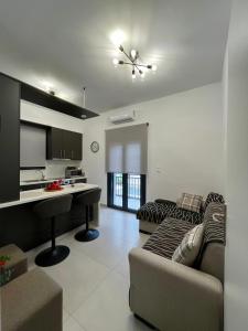 Posezení v ubytování Meintis Apartments Rafina